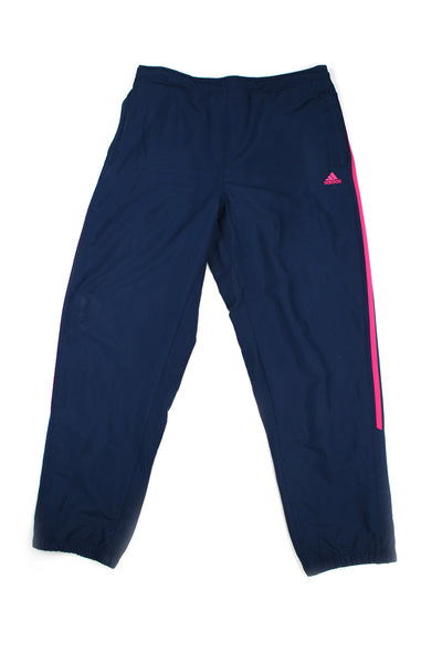 Vintage 00's Adidas blue tracksuit bottoms with pink stripes down the side, embroidered logo, and has a elasticated waist.