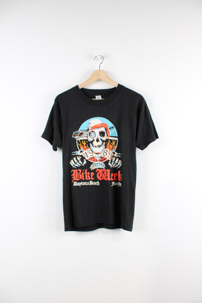 Vintage 1989 Daytona Beach, Bike Week single stitch graphic t-shirt in black. Has skull graphic on the front and Bike Week 1989 spell-out on the back.