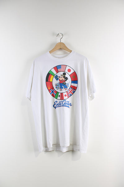 Vintage 00's Disney Mickey Mouse graphic t-shirt in white. Worldwide passport graphic design on the front with Epcot Centre spell-out. 