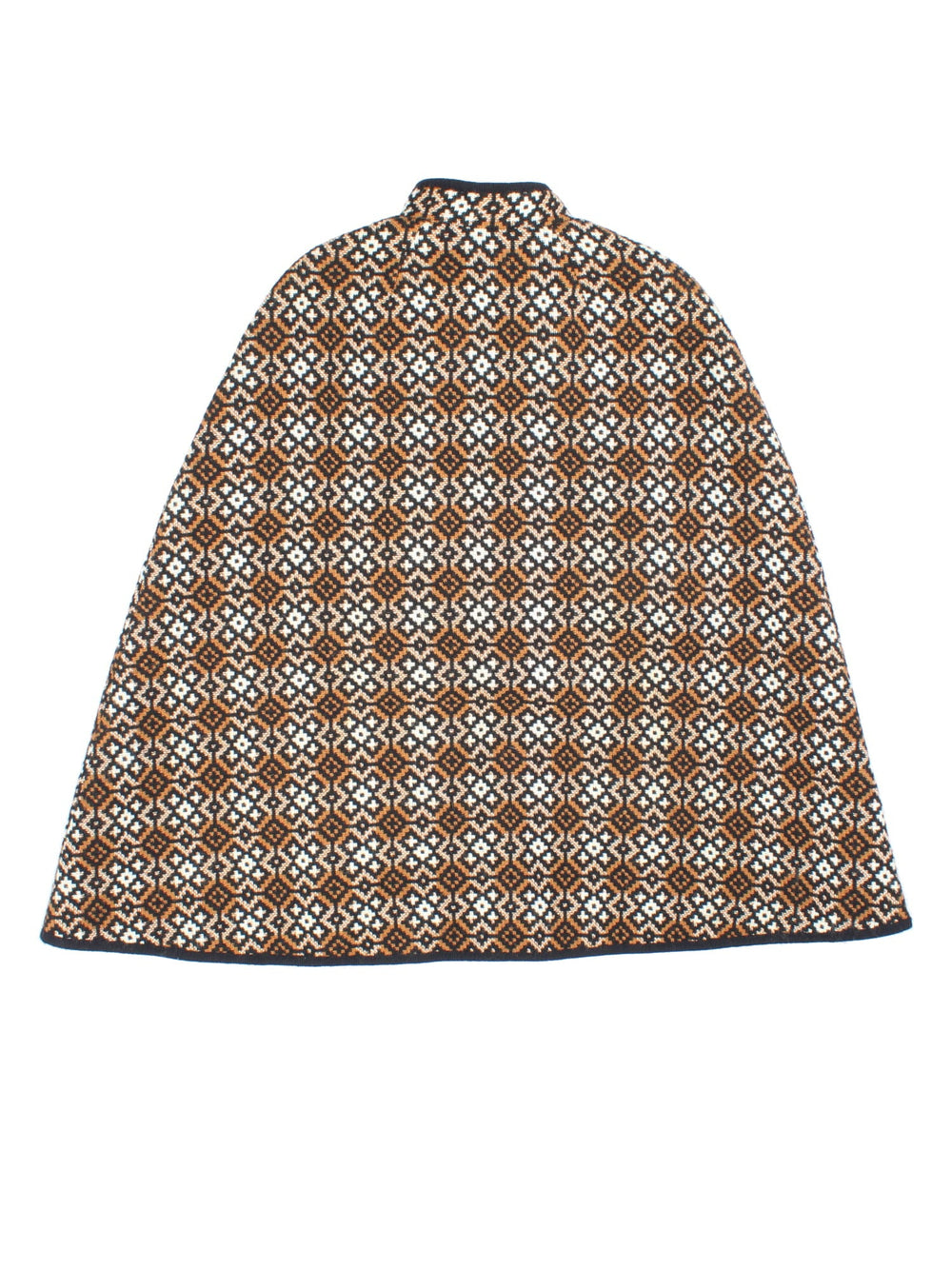 Vintage Welsh Woolen cape in a brown, white and black patterned colourway. Buttons up neckline and is fully lined. Classic double split and belt fastening.