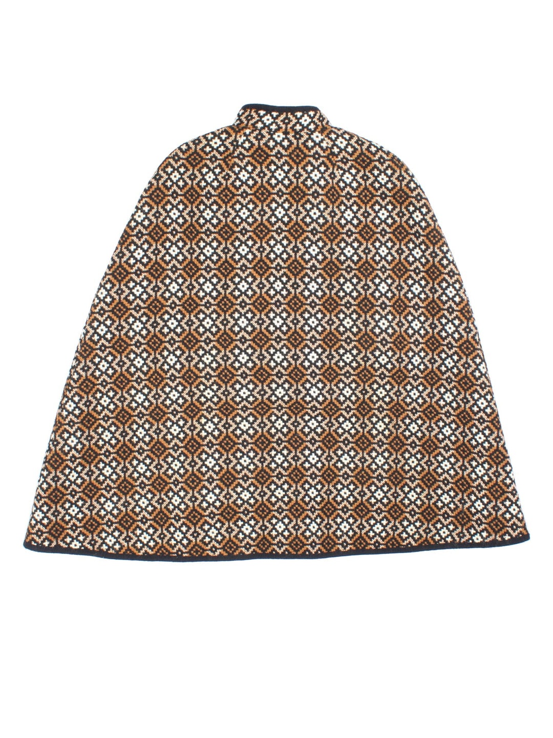 Vintage Welsh Woolen cape in a brown, white and black patterned colourway. Buttons up neckline and is fully lined. Classic double split and belt fastening.