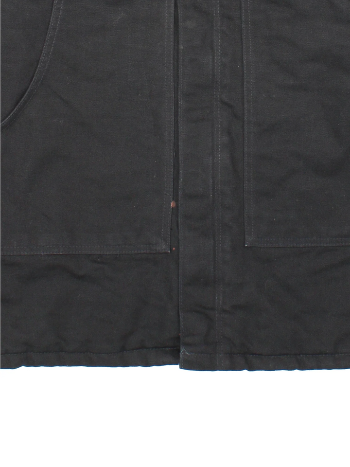 Carhartt Arctic Jacket in a black colourway. Zips up and has multiple pockets, insulated with a quilted lining, and has the logo embroidered on the front.