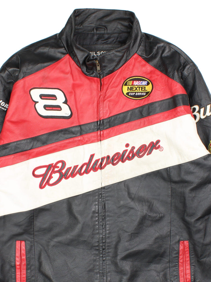 Vintage Nascar Chase Budweiser Dale Earnhardt Jr. Jacket in a black, red and white colourway. Zips up and has side pockets, and the logos and sponsors embroidered all over.