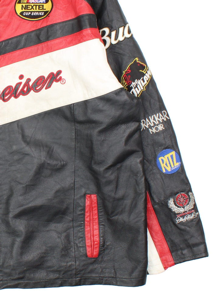 Vintage Nascar Chase Budweiser Dale Earnhardt Jr. Jacket in a black, red and white colourway. Zips up and has side pockets, and the logos and sponsors embroidered all over.