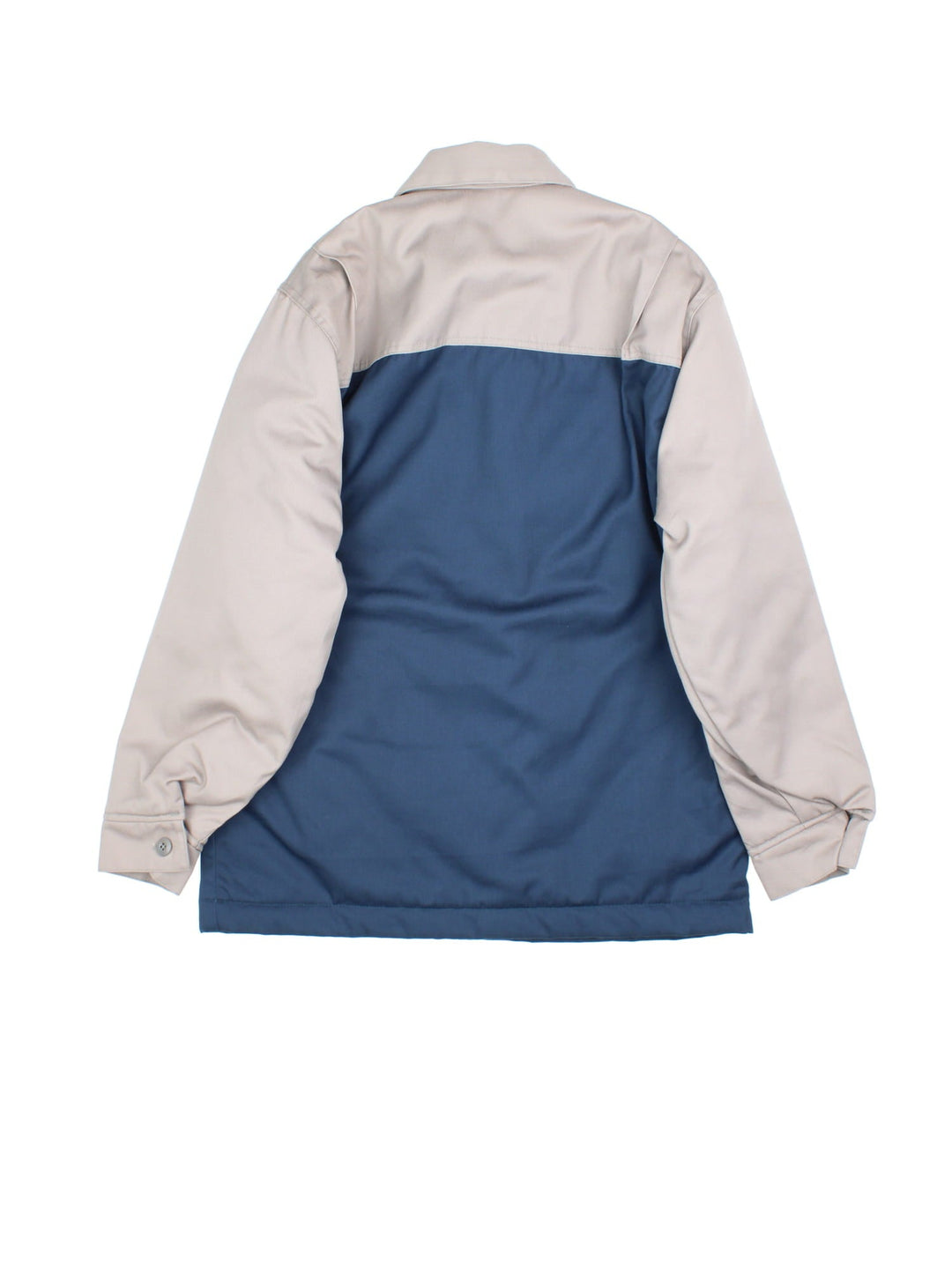Dickies Eisenhower Jacket in a 2 tone blue and grey colourway. Zips up and has side pockets, insulated with a quilted lining, and has the logo embroidered on the front.