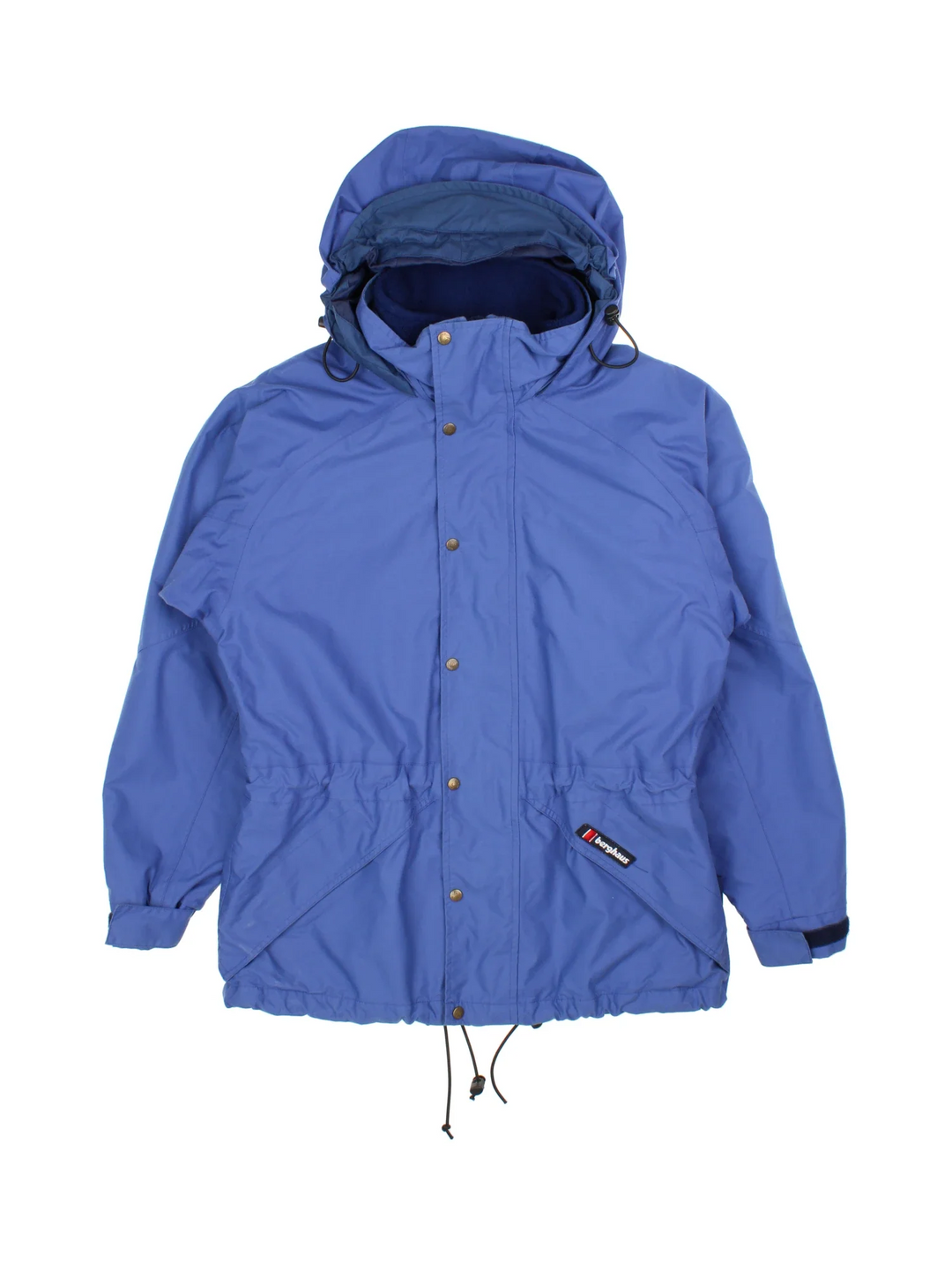 Berghaus Aquafoil Jacket in a blue colourway. Full button and zip up front with multiple pockets, drawstring hood and small logo on the front pocket.