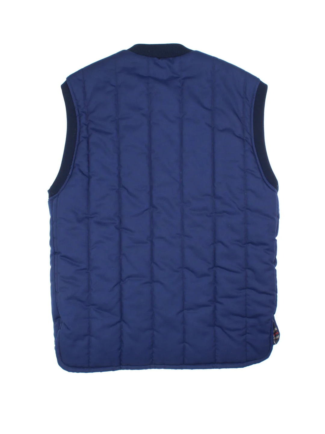 Barbour Quilted Gilet in a blue colourway. Button up fastening, side pockets and embroidered branding on the front.
