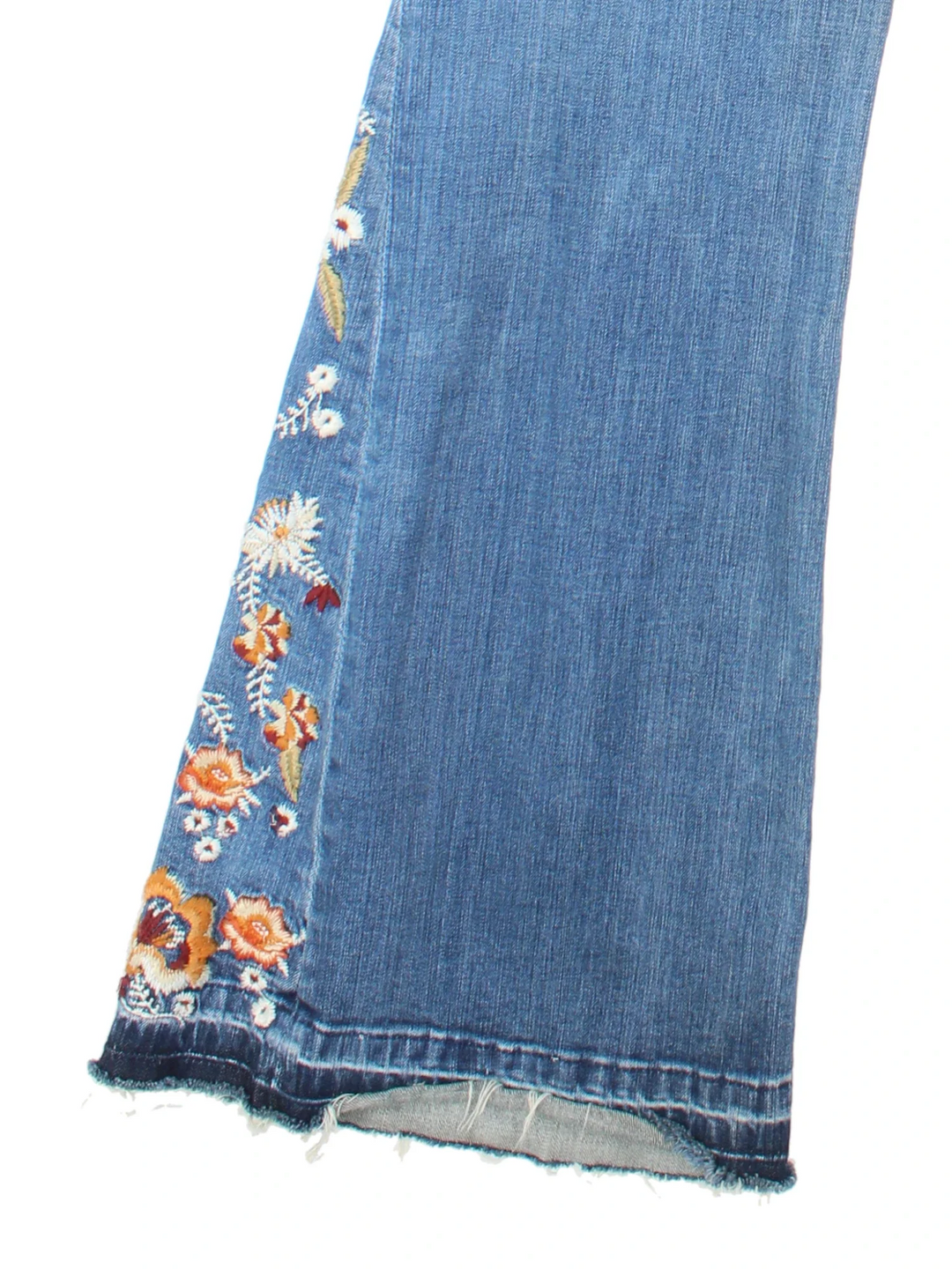 Y2K Embroidered Flared Jeans in blue colourway with multiple pockets, contrast stitching and embroidered detailing on the front/back.