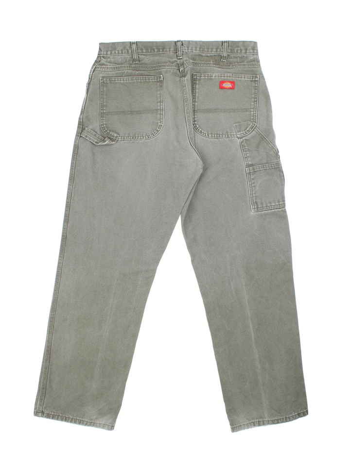 Dickies Carpenter Jeans in green colourway with multiple pockets and the logo embroidered on the back.