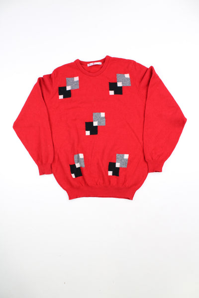 Lyle & Scott red crew neck knitted jumper with square pattern on the front.
