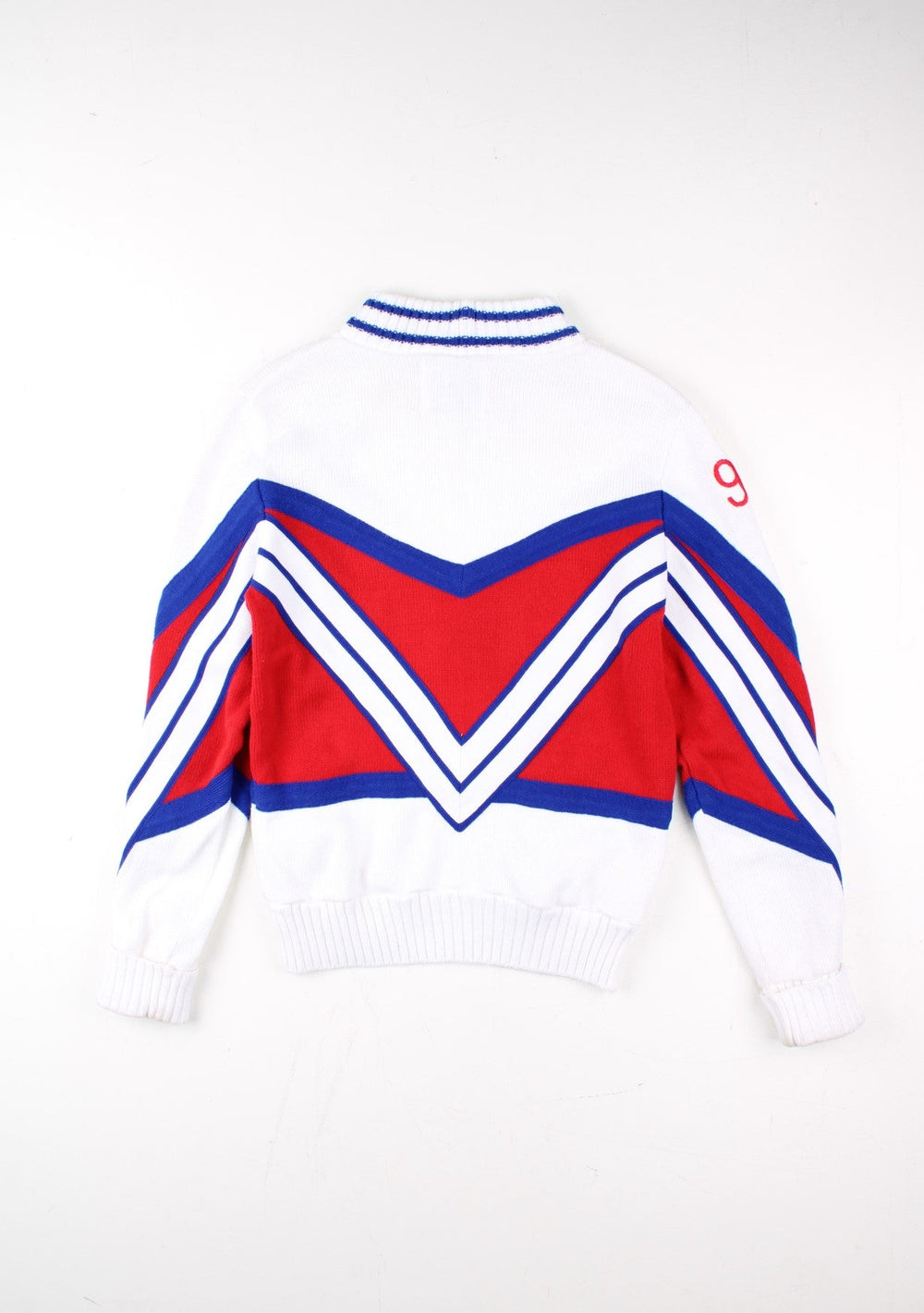 Vintage 70's Colts Cheerleader Jumper in a white/red colourway. Crew neck, with logo on front and sleeve.