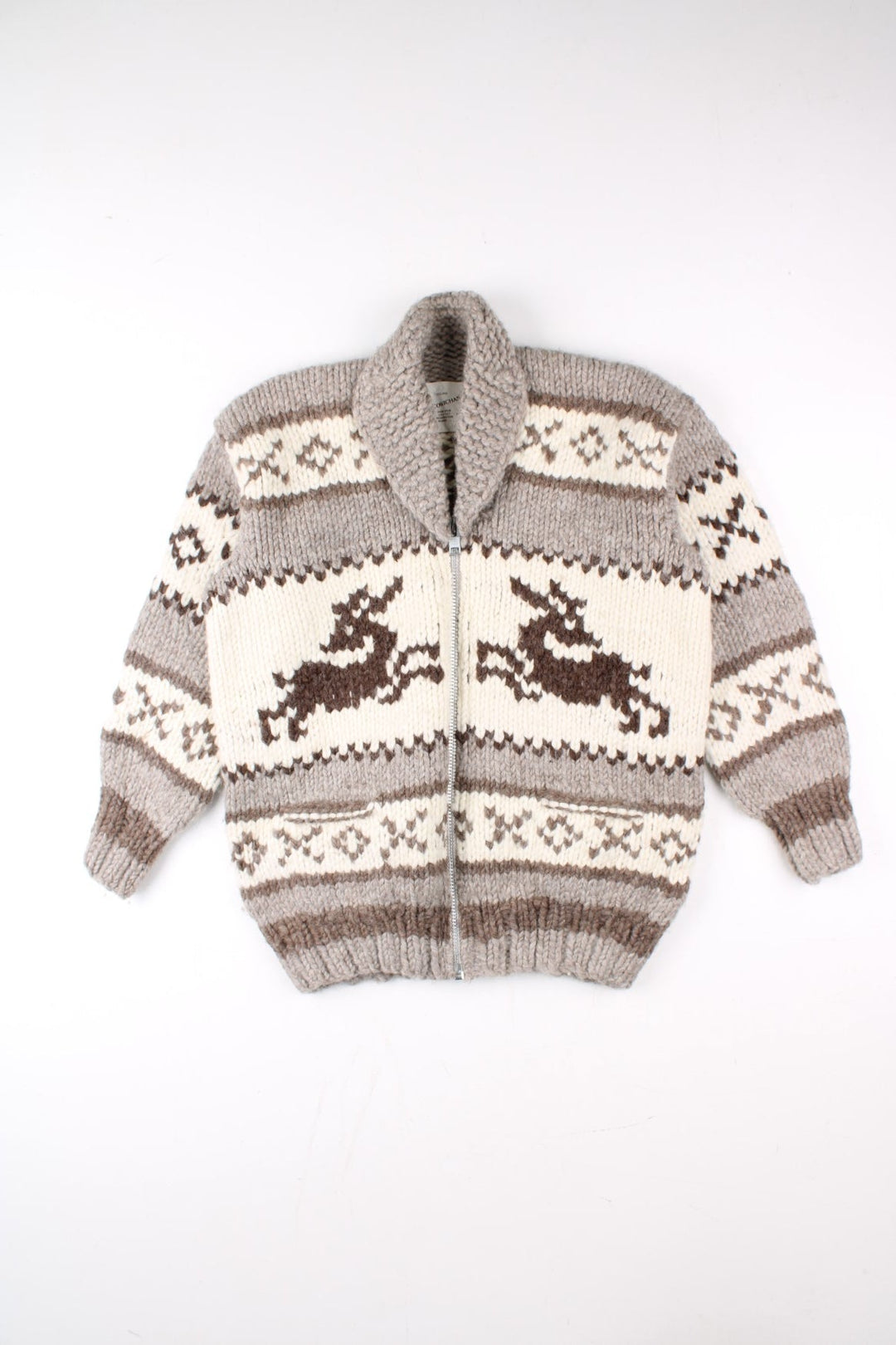 70's Cowichan Cardigan in a grey/cream colourway. Zip up fastening with all over fair isle pattern.