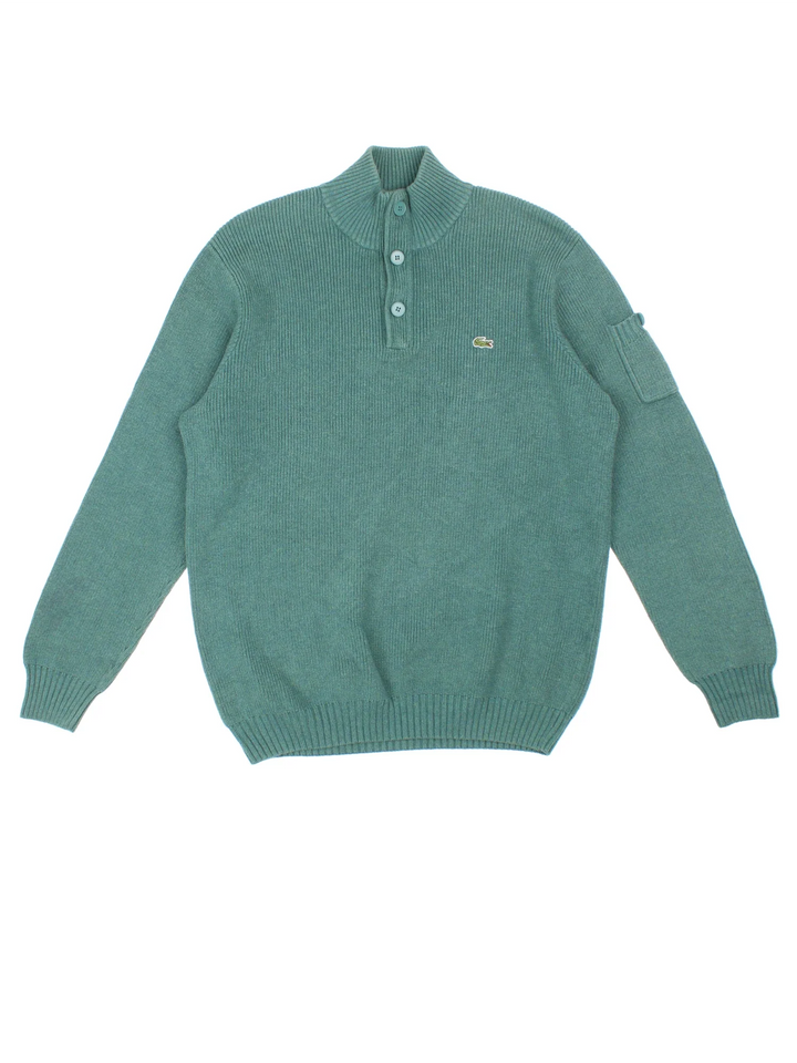 90's Lacoste Jumper in a green colourway with 1/4 zip/button neckline and branding embroidered on the front.