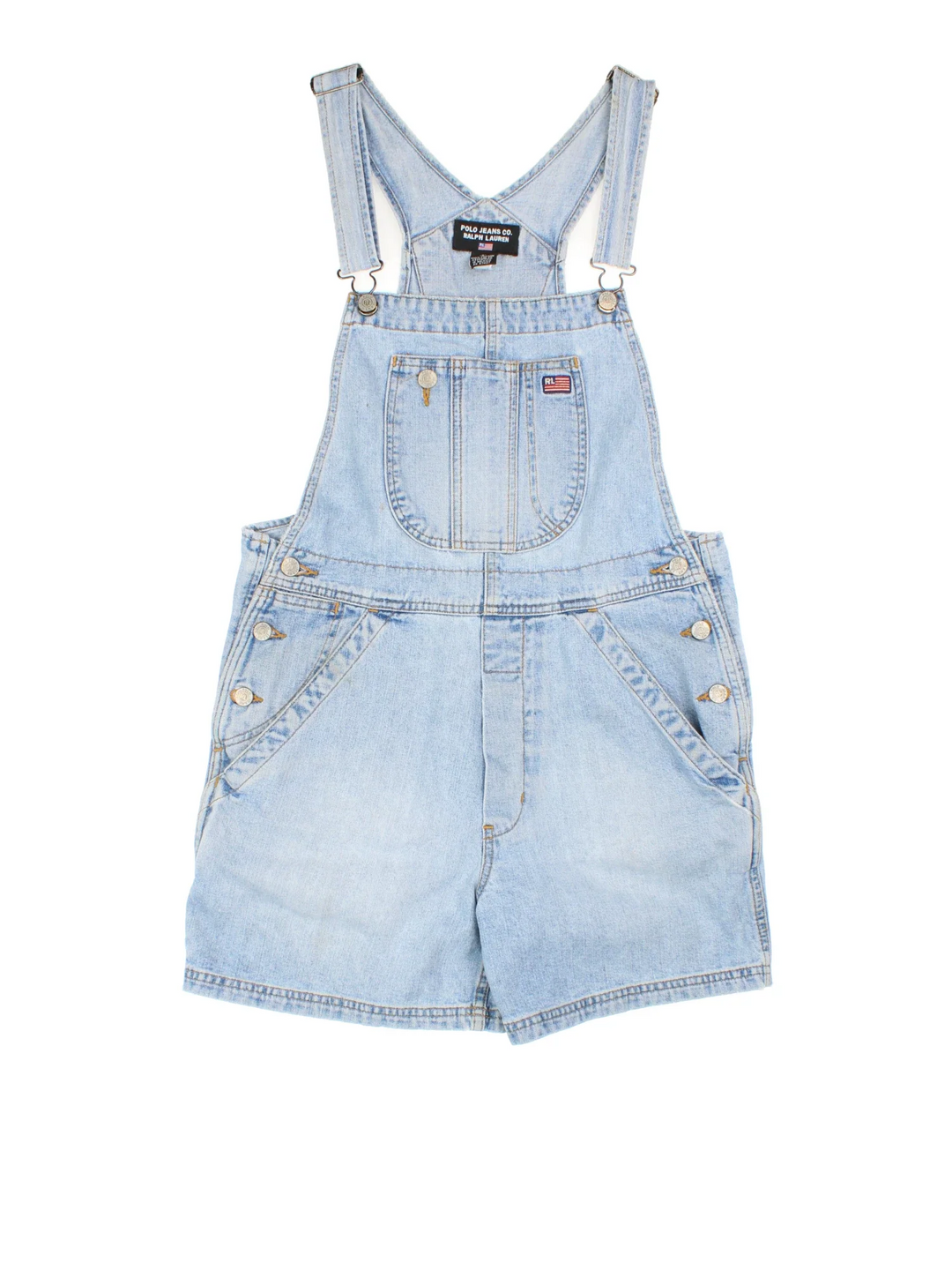 Ralph Lauren Short Dungarees in blue colourway with multiple pockets, adjustable straps and the logo embroidered on the front/back.