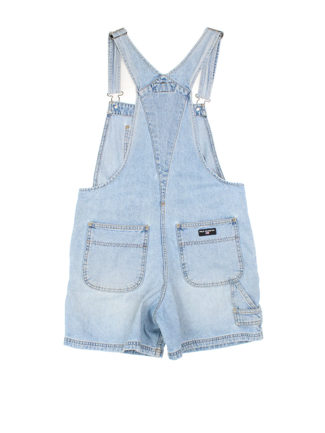 Ralph Lauren Short Dungarees in blue colourway with multiple pockets, adjustable straps and the logo embroidered on the front/back.