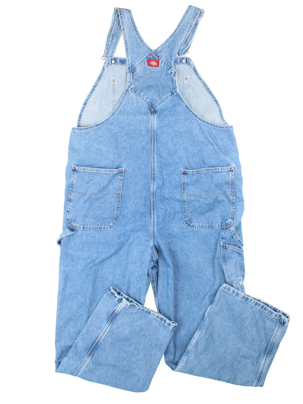 Dickies Dungarees in blue colourway with multiple pockets, adjustable straps and the logo embroidered on the front.