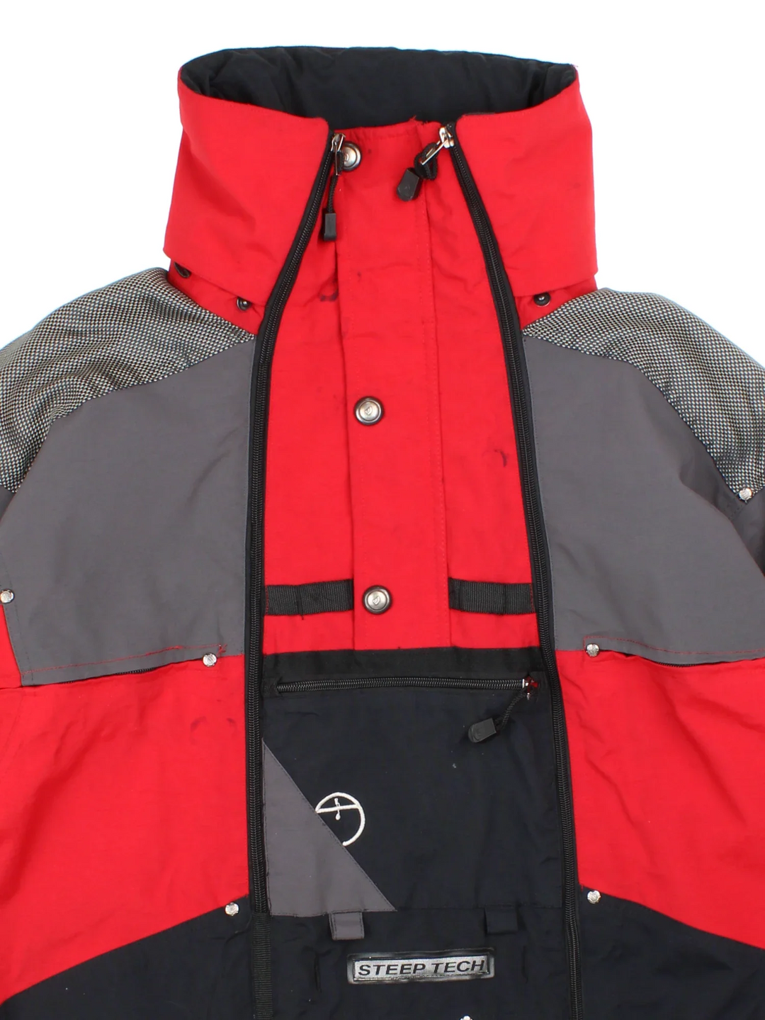 Vintage 90's The North Face Steep Tech Jacket in a red/black colourway, zips up and has multiple pockets, hooded, insulated with a gore tex lining, and has the logo embroidered on the front/back and sleeve.