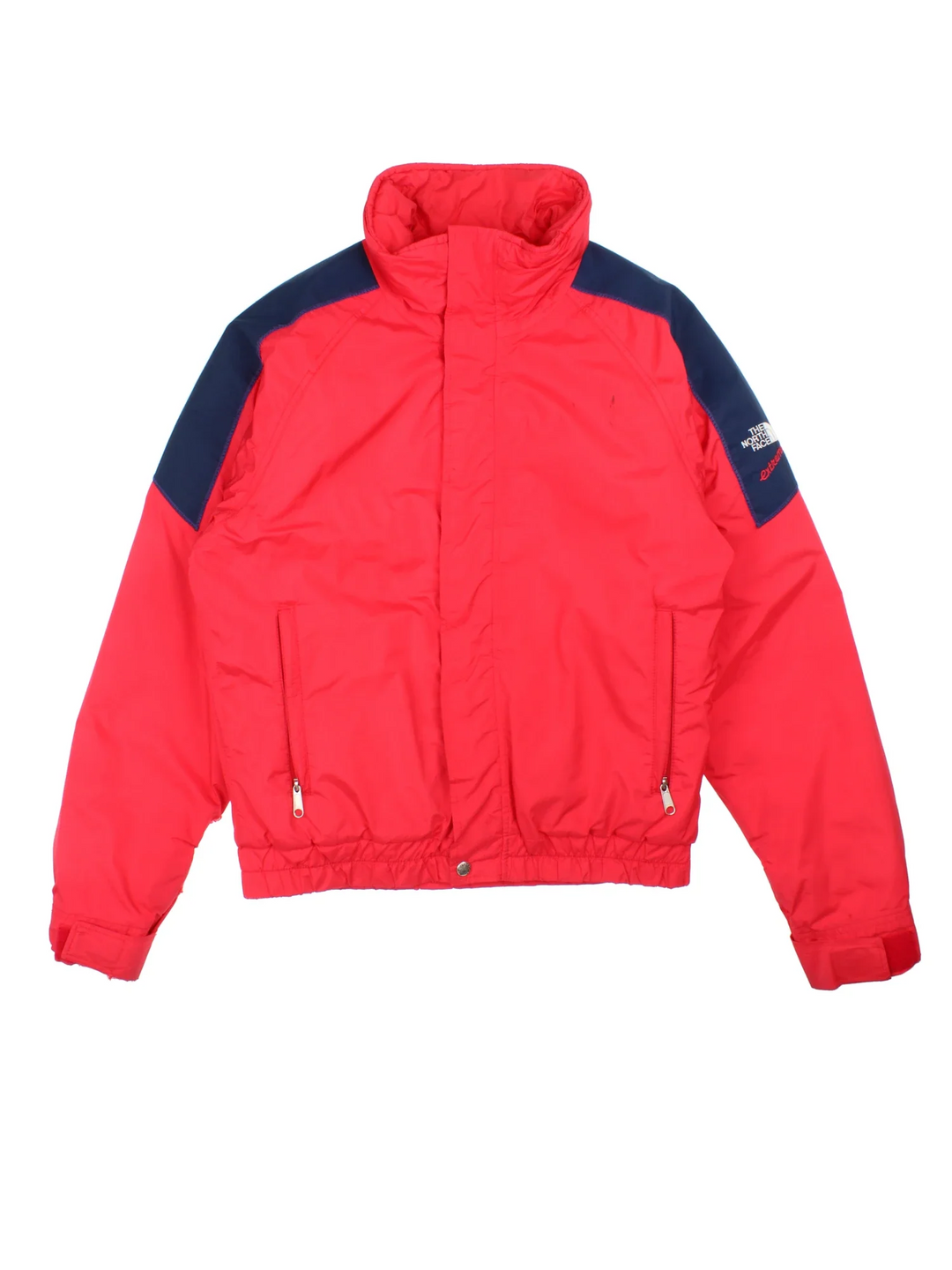 Vintage 90's The North Face Extreme Jacket in a red/blue colourway, zips up and has multiple pockets, insulated with a padded lining, and has the logo embroidered on the sleeve.
