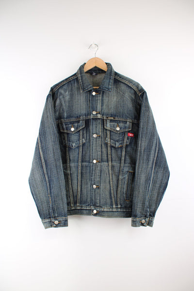 Vintage Diesel button up truckerstyle denim jacket with pockets and embroidered logo on the chest