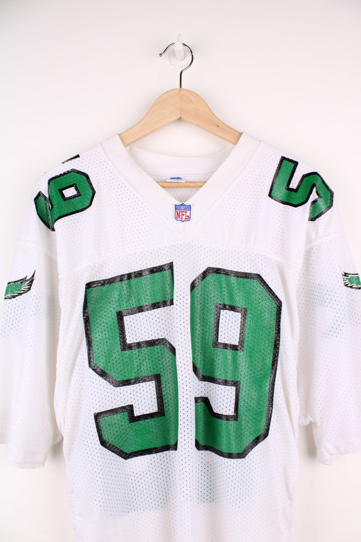 90's NFL Philadelphia Eagles Russell Athletic Jersey in a white, green and black colourway, Seth Joyner number 59 printed on the back and on the front with logos.