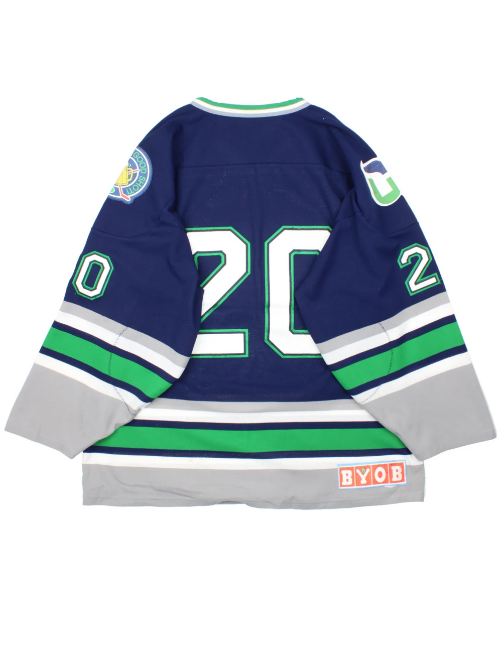 Charleston Barflies NHL Jersey in a  blue colourway, features embroidered logos and badge on the front and sleeves. Green,white and sliver stripe detailing and large number on the back.
