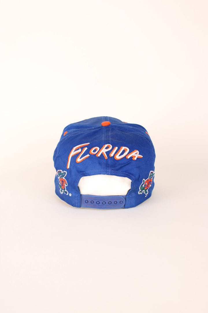 Vintage Florida Gators Cap in blue and orange with adjustable strap on the back.