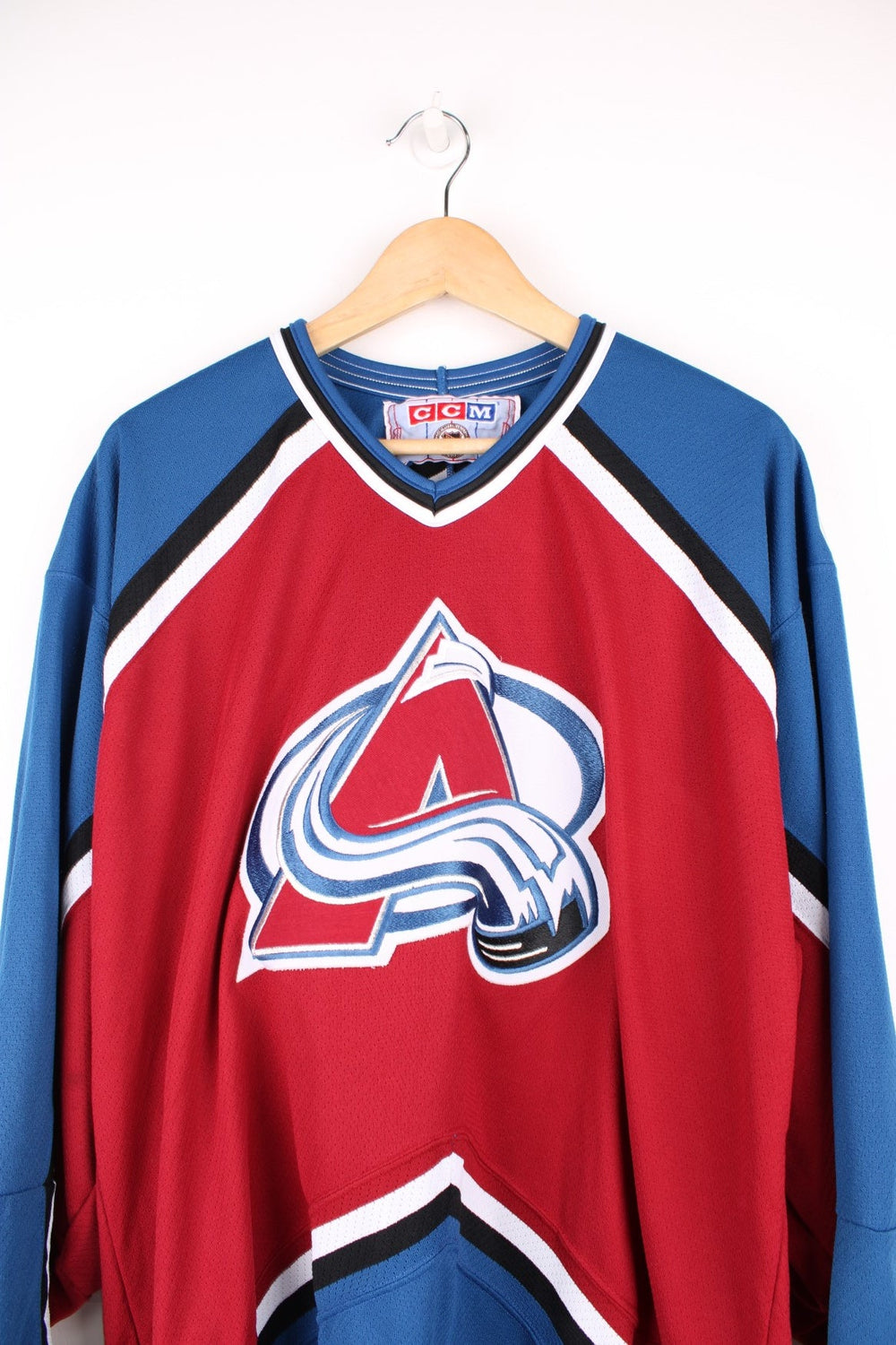 Vintage Colorado Avalanche CCM, NHL Hockey jersey in a red, white and blue colourway.