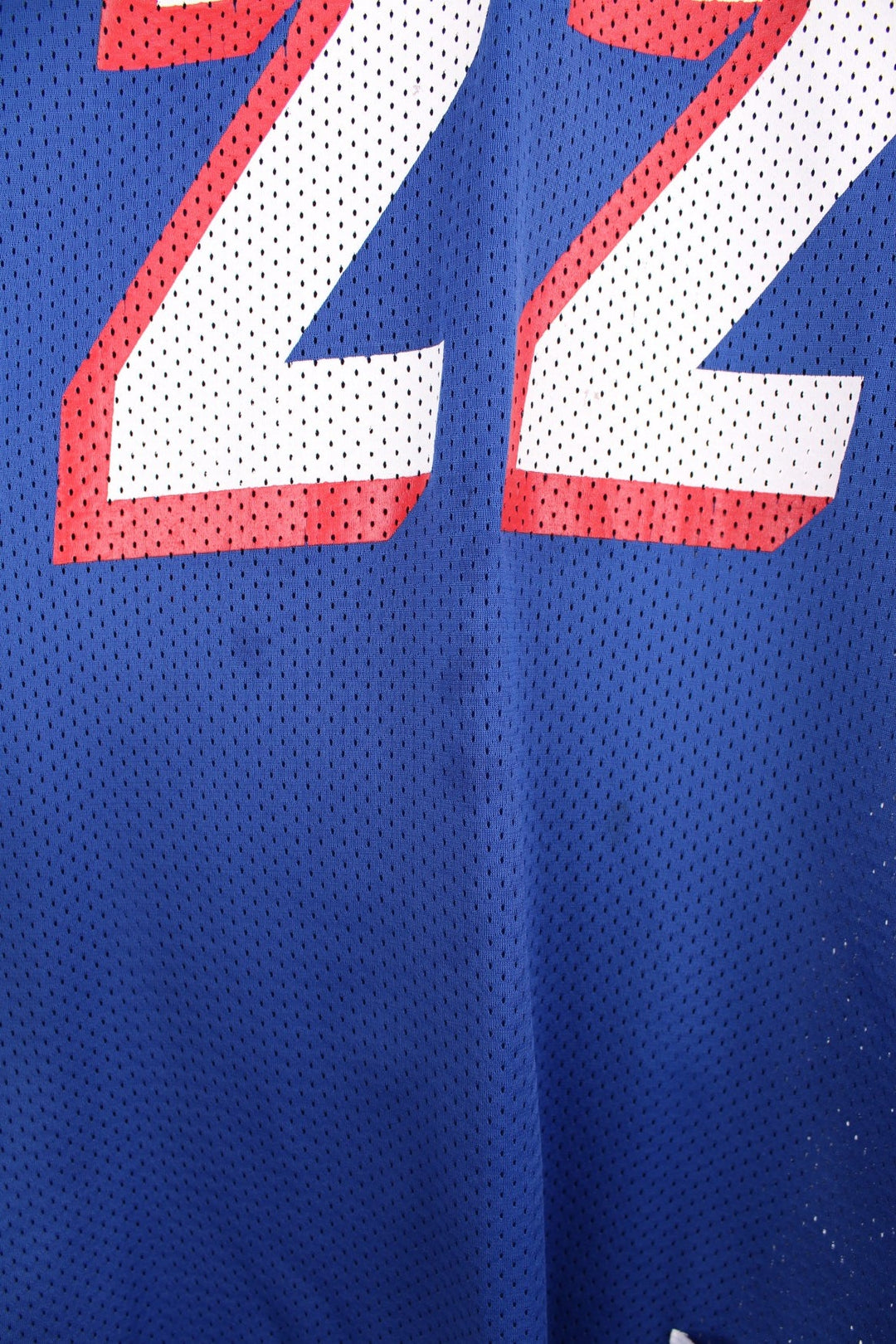 Champion New England Patriots jersey in blue with red and white accents, embroidered champion logos, printed team logos, and no. 22 Meggett on the back.