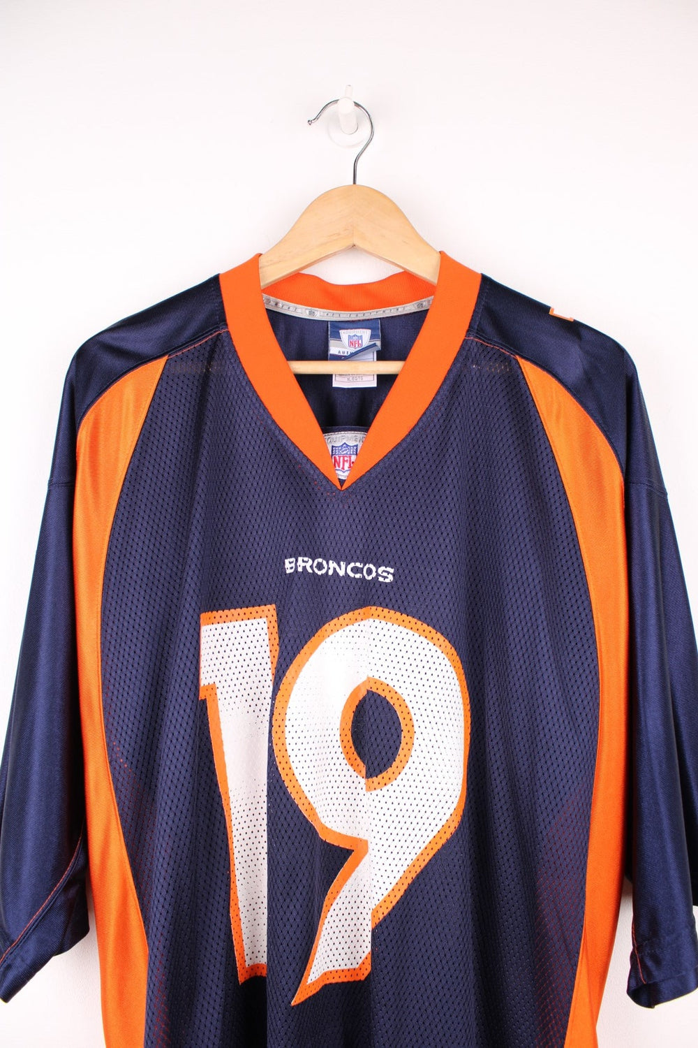 Denver Broncos, Royal #19, Reebok NFL jersey in a blue and orange colourway. Features printed 19 on the front and back.