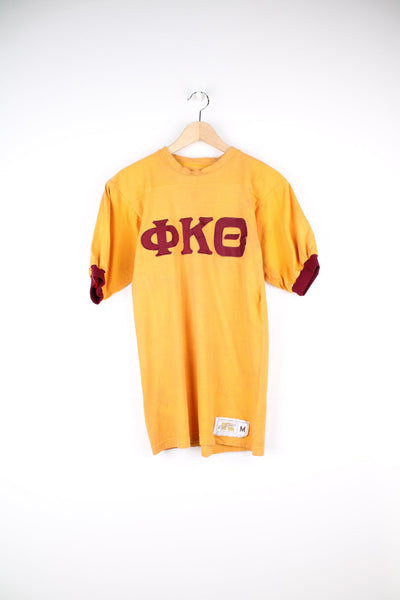 Vintage 60s american college sports team T-Shirt in yellow and red.