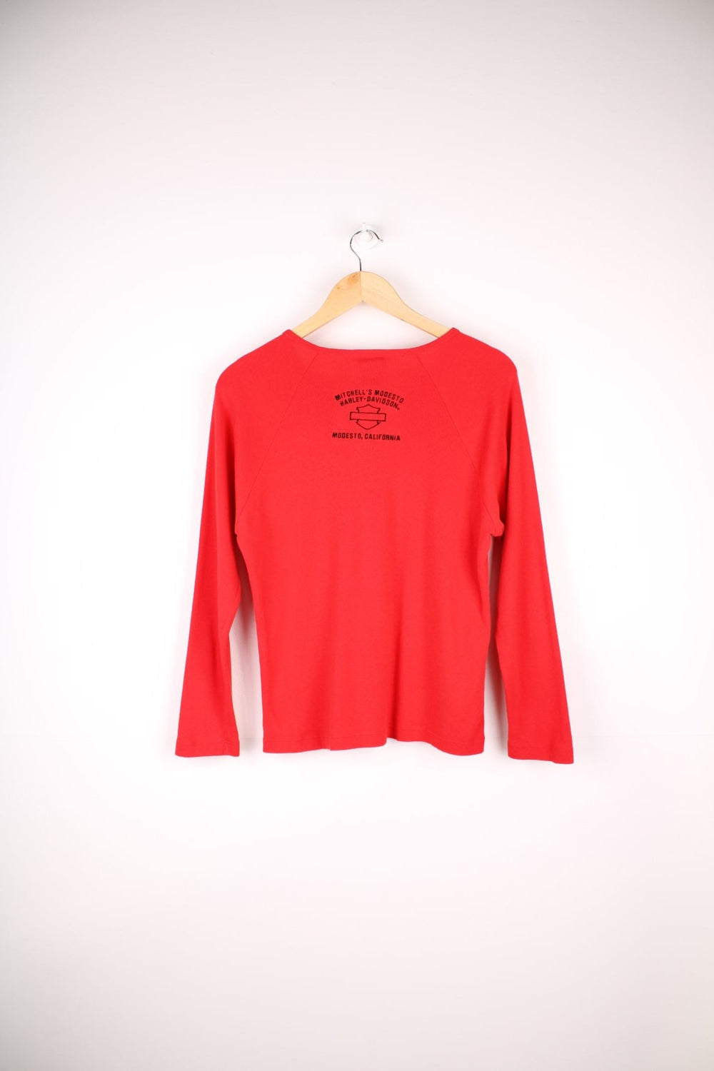 Y2K Longsleeve Zip Up Shirt in a  colourway with the spell out logo embroidered on the front and back.