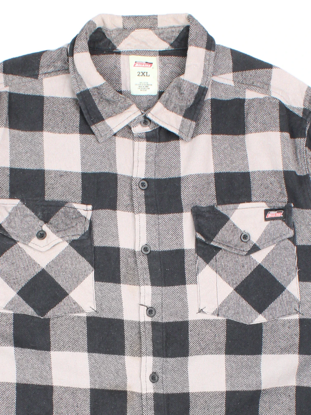 Vintage Dickies Flannel Shirt in a grey and black colourway, button up and has double chest pockets with the logo embroidered on the front.