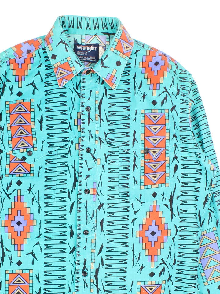 Wrangler Western Shirt in a blue colourway with Aztec pattern. Button up with two front pockets.