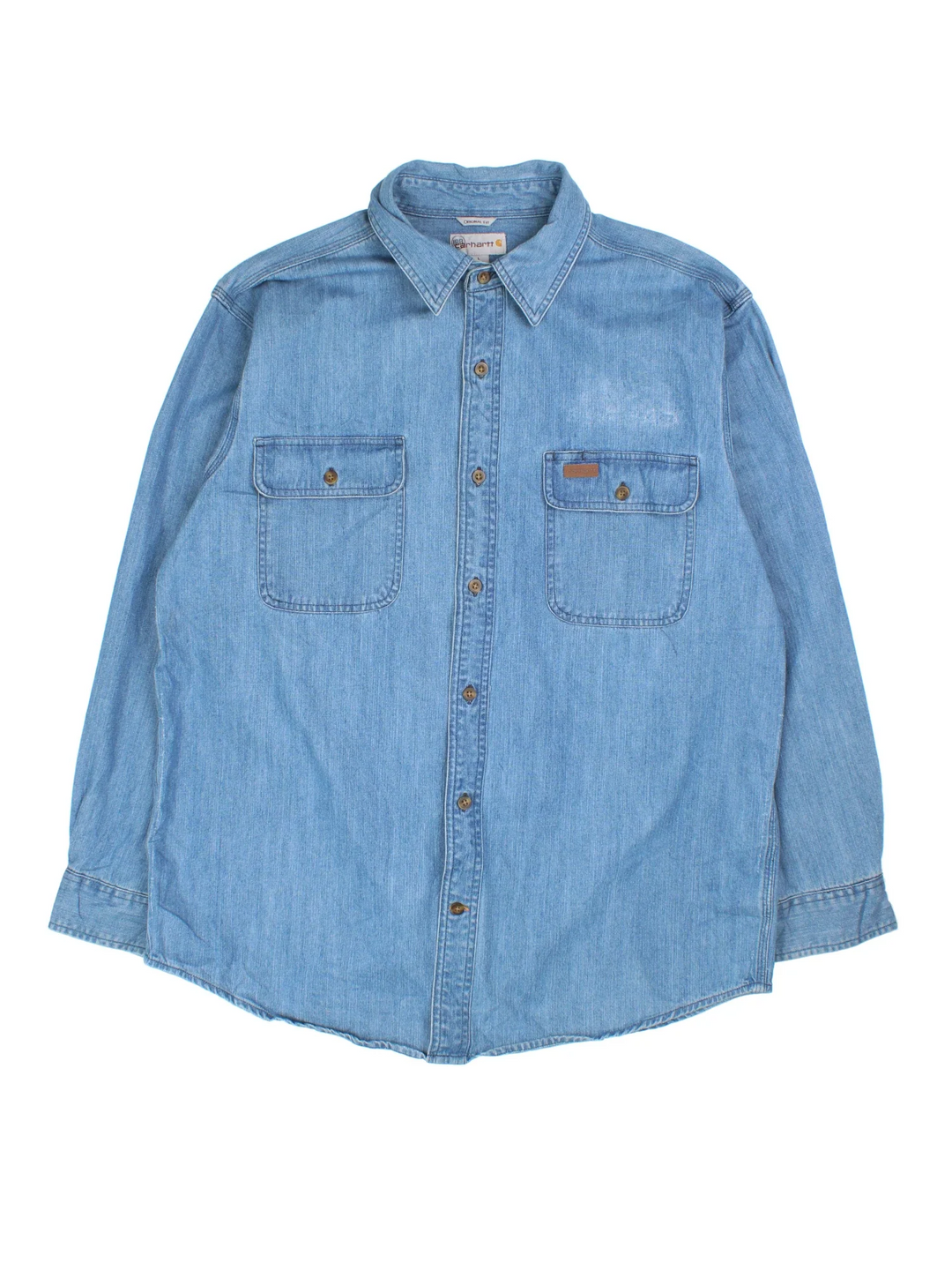Carhartt Denim Shirt in a blue colourway, buttons up and has double chest pockets with the logo tab embroidered on the front.