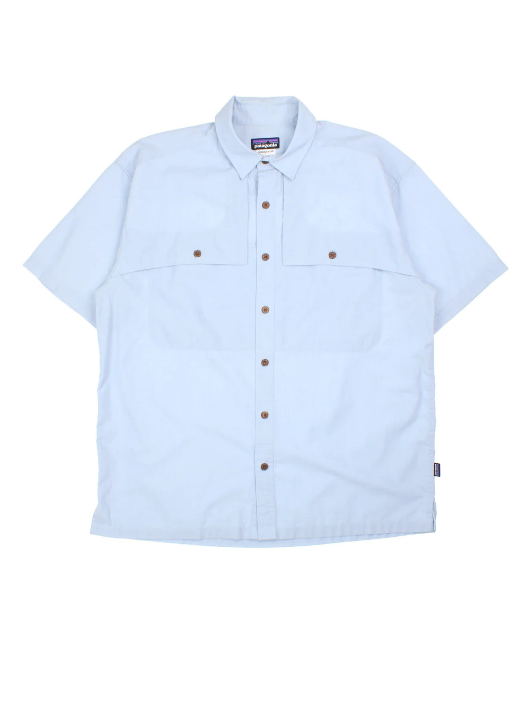 Patagonia Shirt in a blue colourway. Button up, front pocket detail and side tab branding.