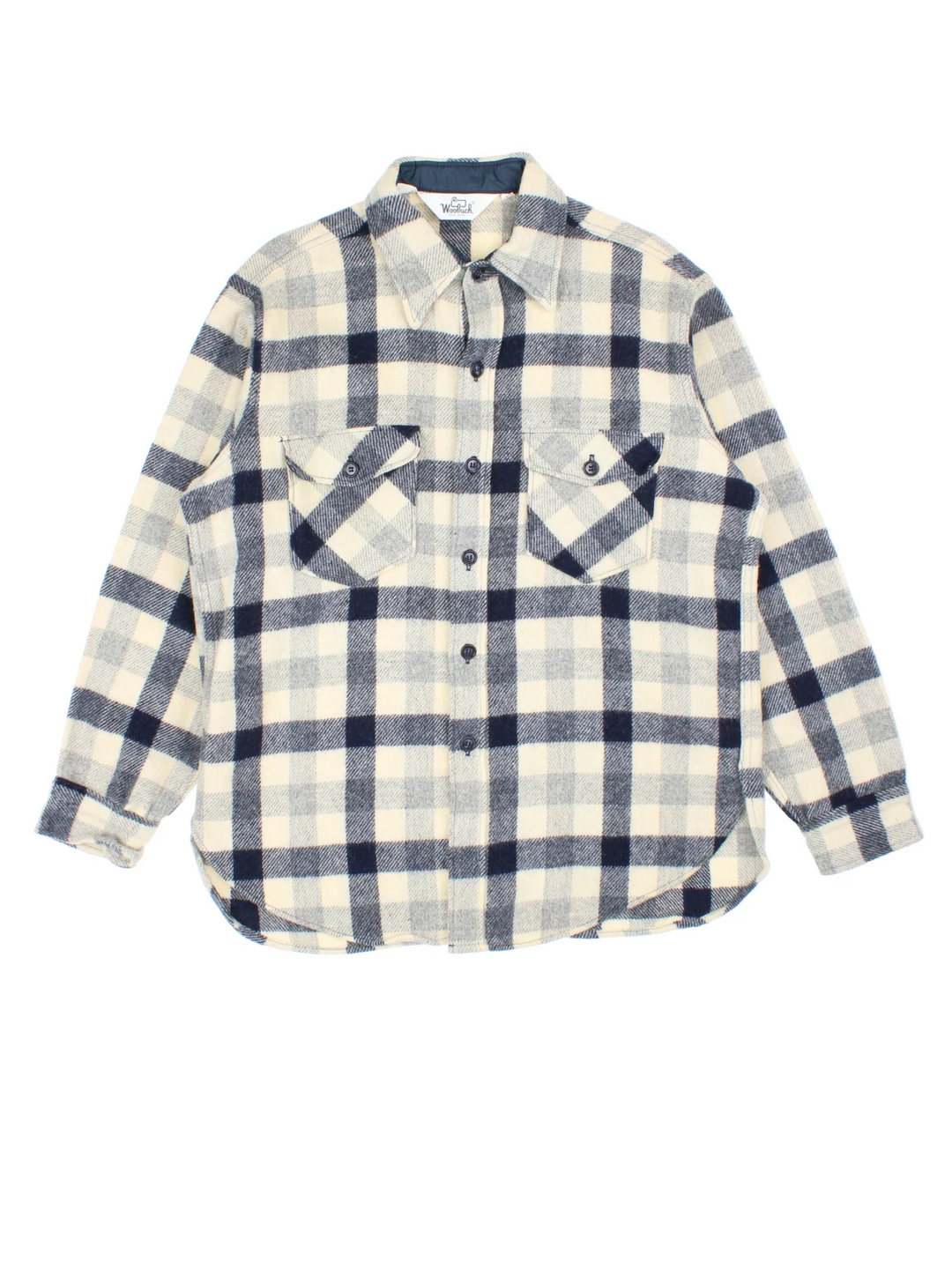 Woolrich Flannel Shirt in a blue colourway with all over plaid pattern. button up with two pockets on the front.