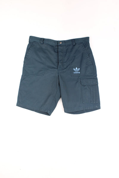 Vintage Adidas Cargo Shorts in a blue colourway, multiple pockets and has the logo emboridered on the front. 