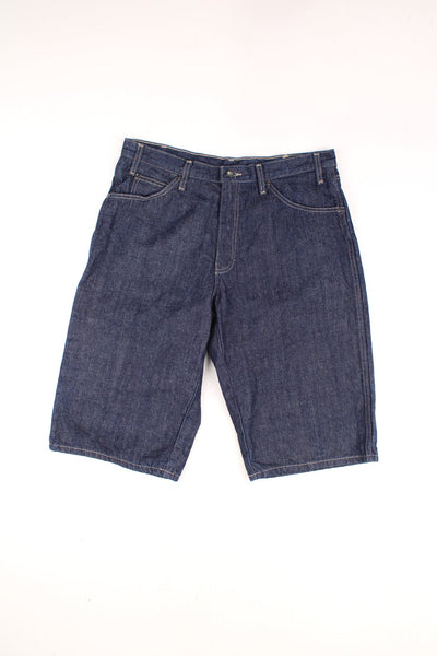 Dickies Carpenter Shorts in a raw denim blue colourway, multiple pockets, and has the logo embroidered on the back. 