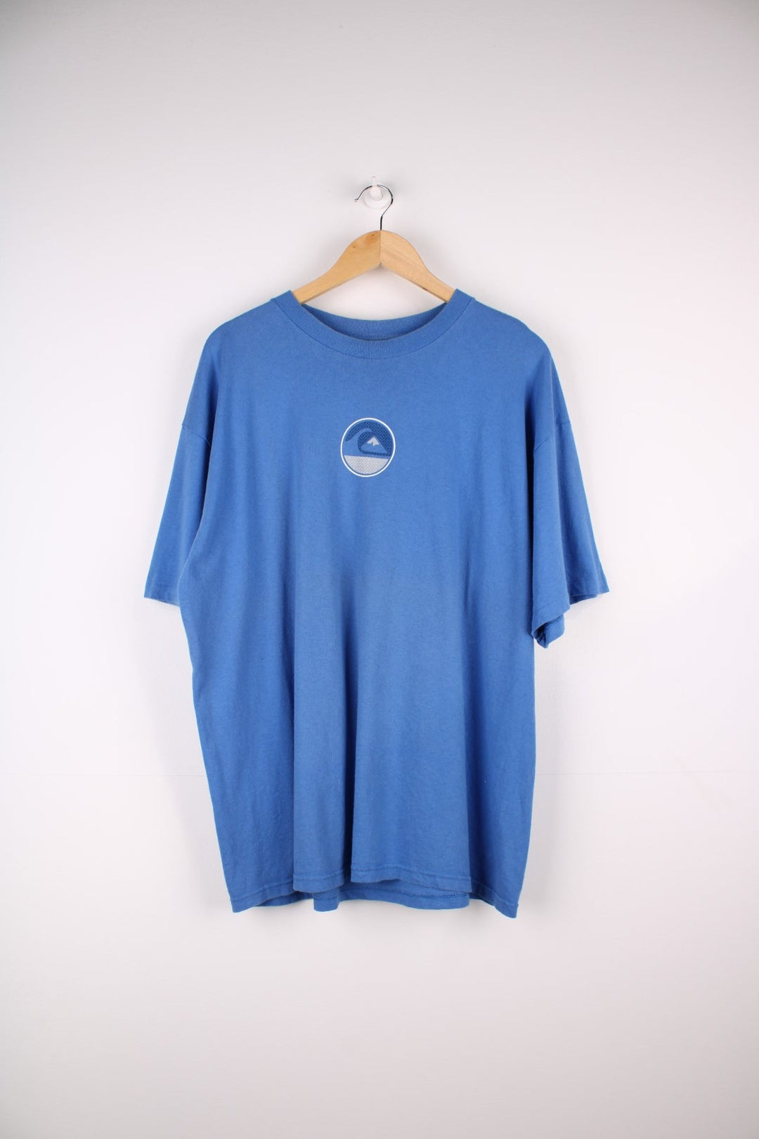 Single stitch Quiksilver T-Shirt in a blue colourway with a wave graphic printed on the front and larger on the back.