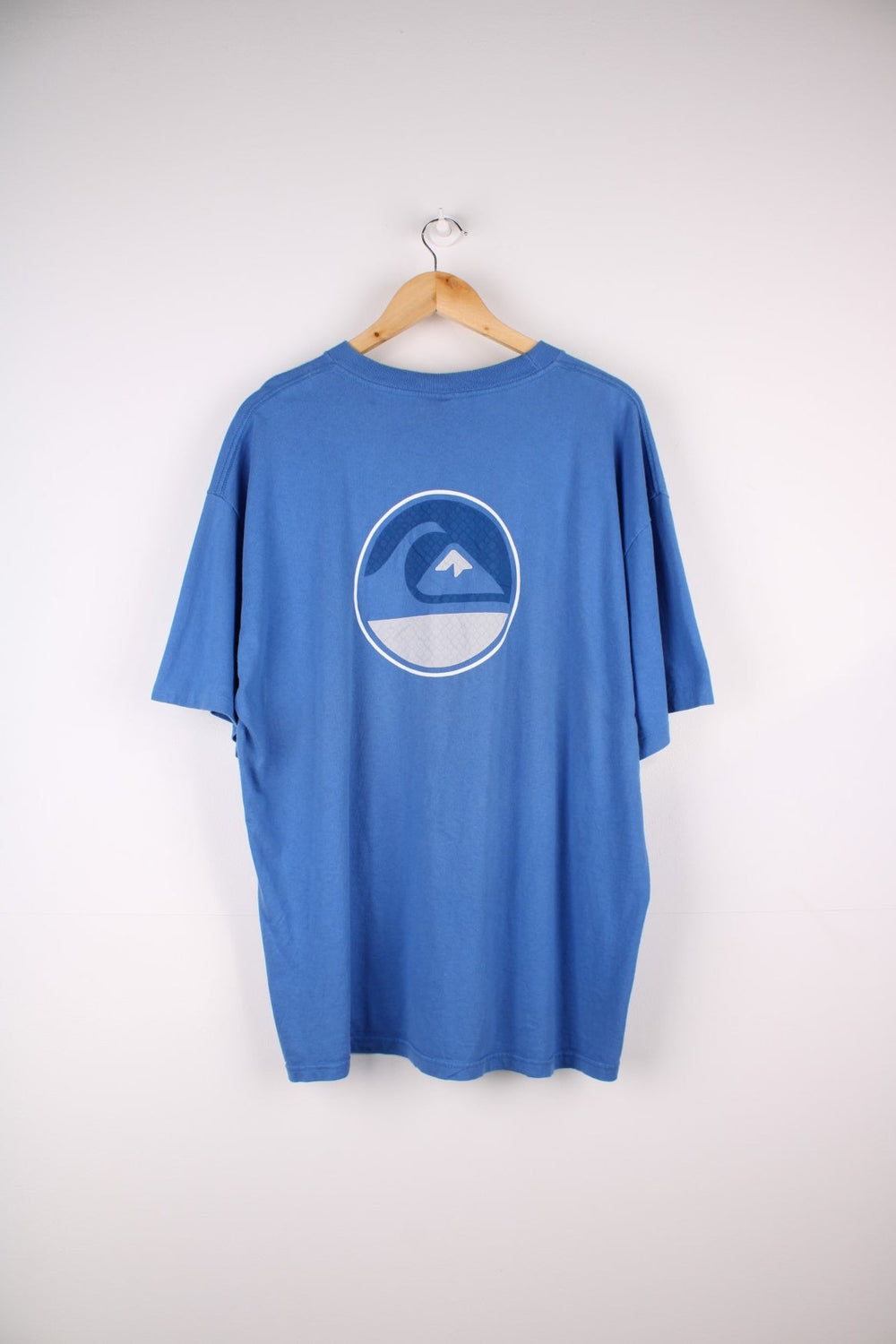 Single stitch Quiksilver T-Shirt in a blue colourway with a wave graphic printed on the front and larger on the back.
