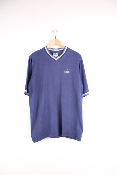 Adidas T-Shirt in a blue and white colourway, v neck and has the logo embroidered on the front.