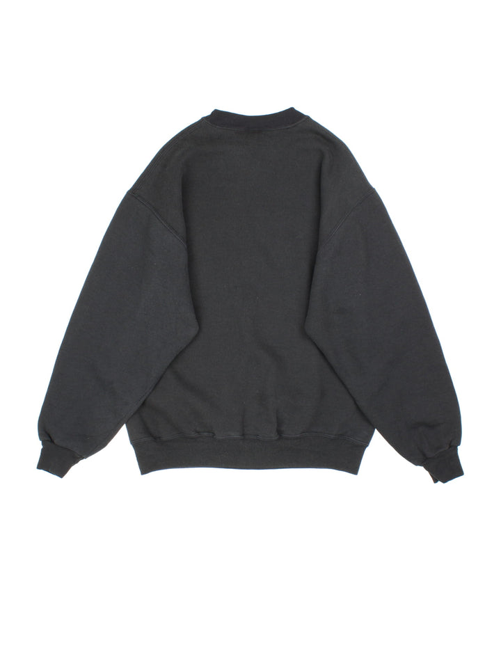 Vintage 1995 Pittsburgh Steelers NFL Sweatshirt in a black colourway with the team logo and spell out printed on the front.