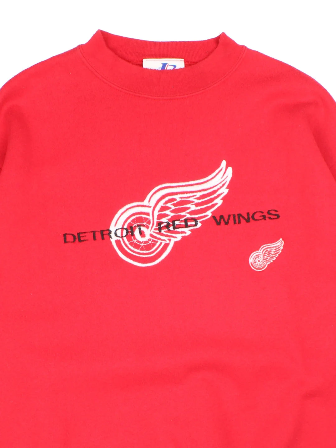 Vintage Detroit Red Wings NHL Sweatshirt in a red colourway with the logo and graphic across the front.