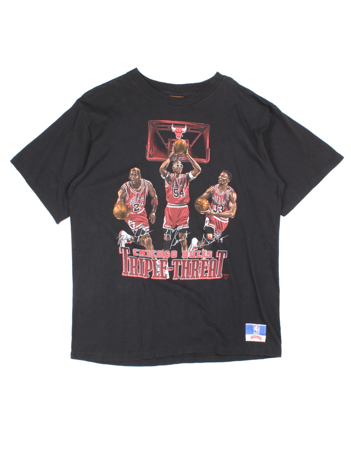Vintage 90's 'Chicago Bulls Triple Threat' single stitch t-shirt features Michael Jordan, Scottie Pippen and Horace Grant printed graphic on the front