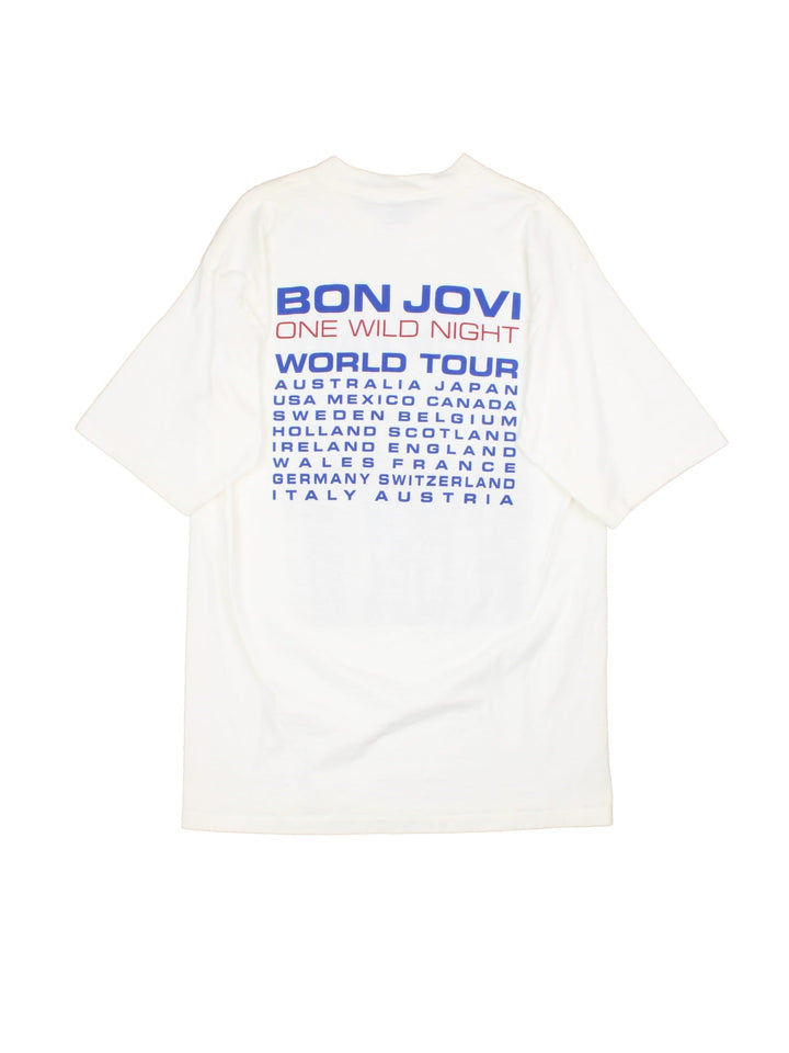 Vintage 2001 Bon Jovi One Wild Night World Tour T-Shirt in a white colourway with the band graphic print on the front and spell out and tour dated printed on the back.