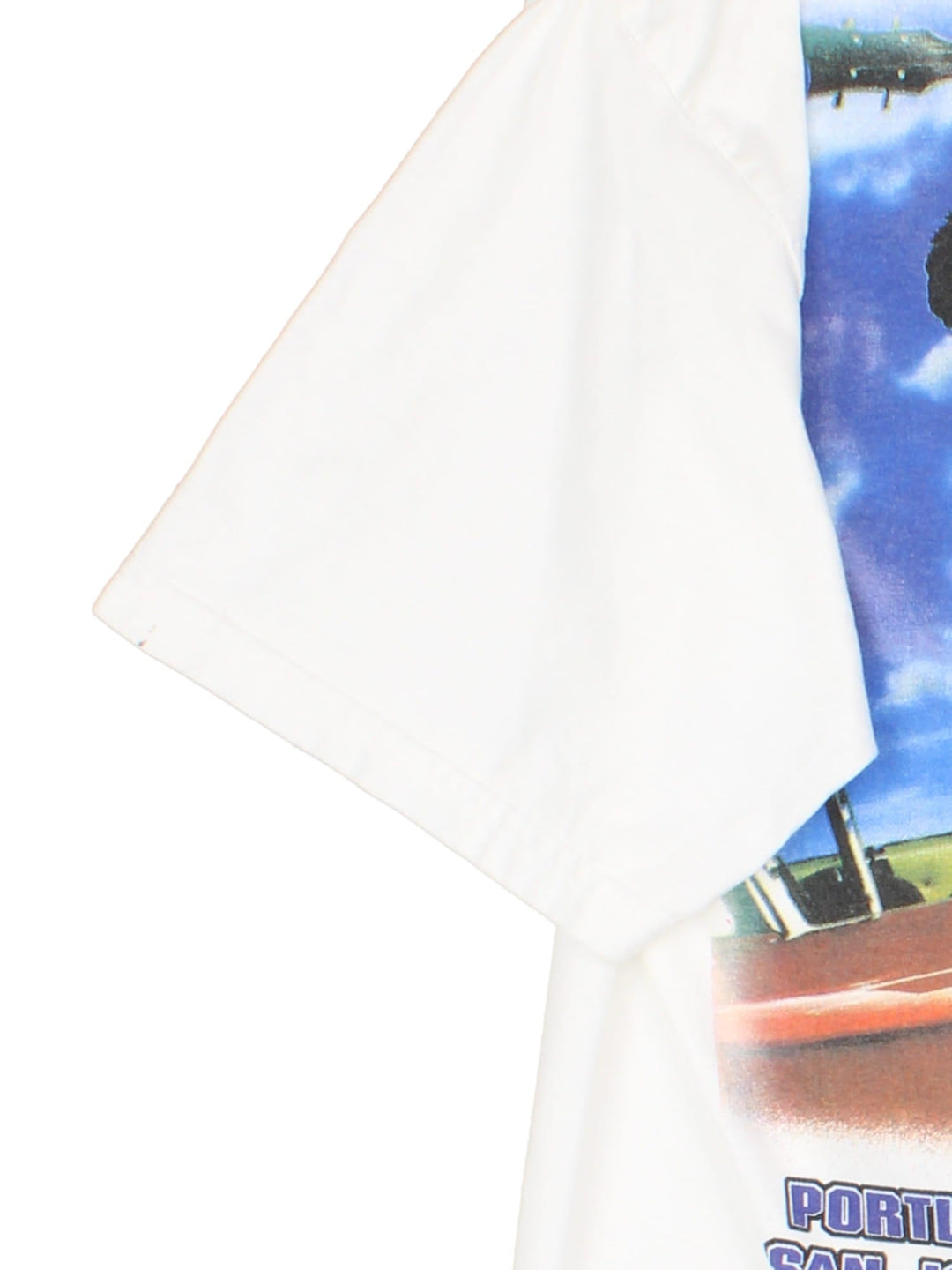 Vintage 2002 Paul McCartney Back In The US Tour T-Shirt in a white colourway with graphic print on the front and back alongside spell out of tour locations.