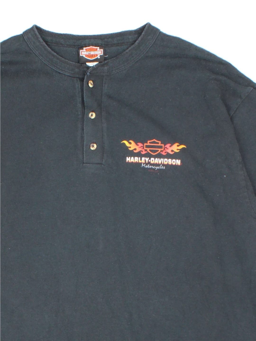 Vintage Harley-Davidson South Dakota T-Shirt in a black colourway with x3 button fastening and printed branding on front/back.