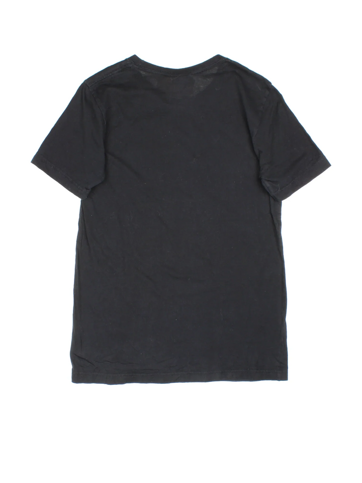 Vintage Thrasher T-Shirt in a black colourway with the logo printed across the front.