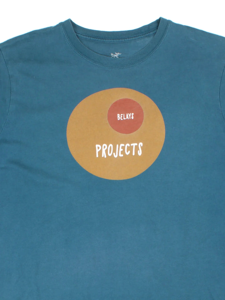 Arcteryx Belays Project T-Shirt in a blue colourway, with branding printed on the front and back.