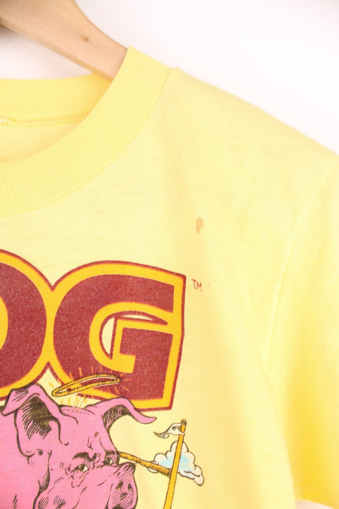 1983 Washington Redskins 'Hog Heaven' World Championships tee in yellow with pig and clouds design.